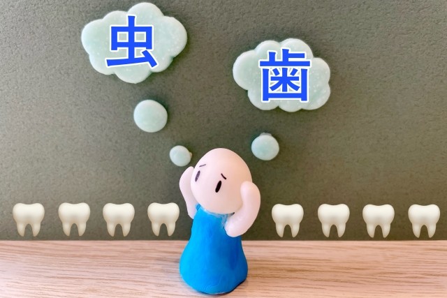 虫歯に悩む様子